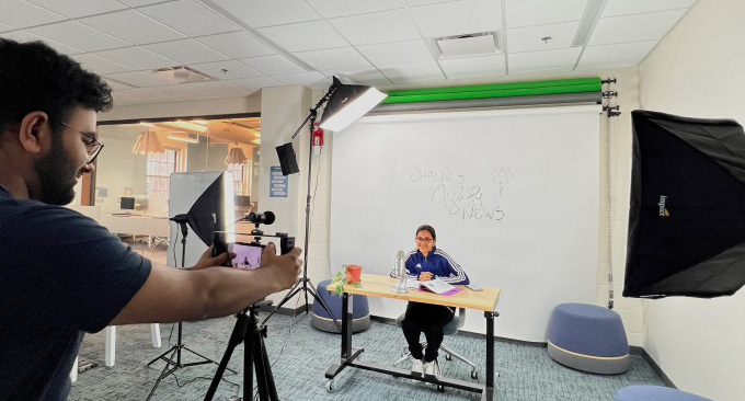 Students recording in the Filmmaker Studio.